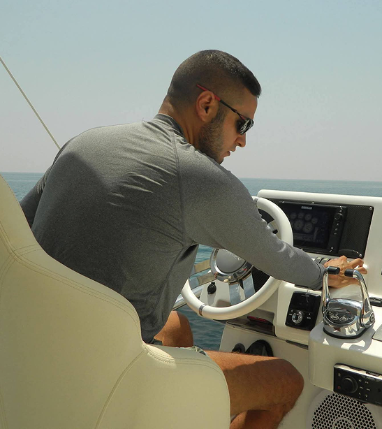 Adam Tamizi Haque on a boat